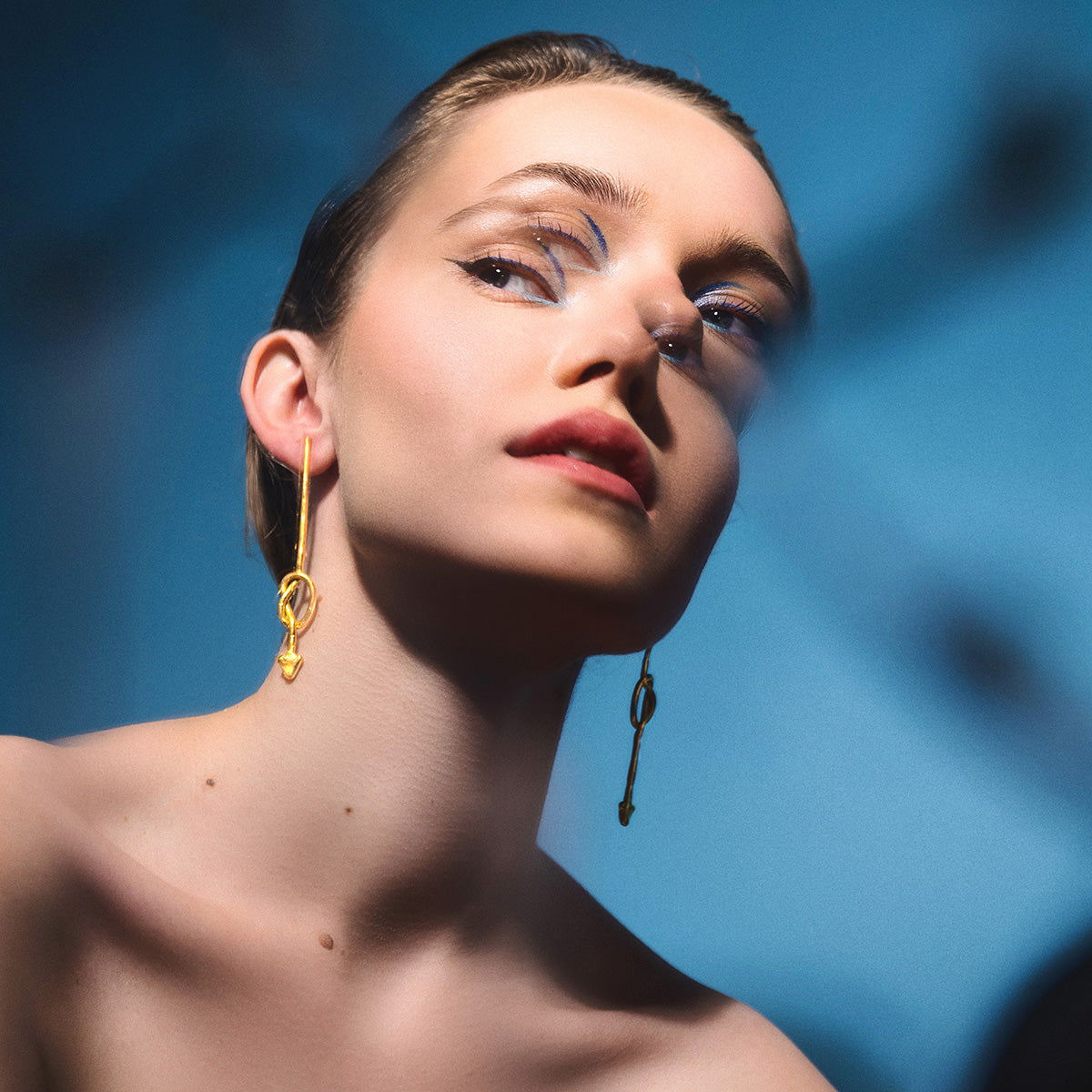 Golden Knotted Arrow Earrings