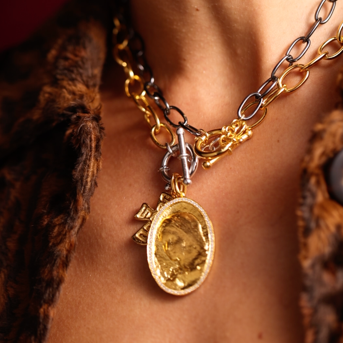 Golden cross pendant on chain